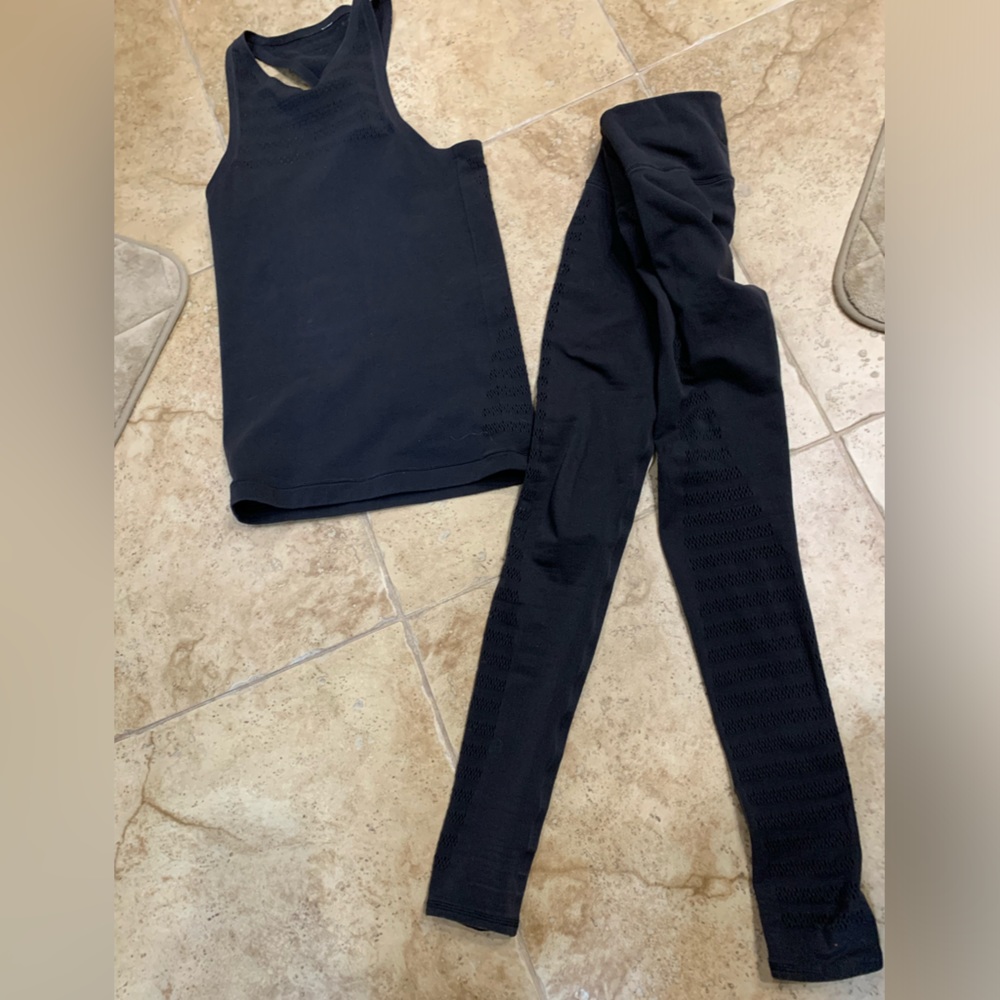 Black size 4 lululemon set (top and bottom) form fitting,sweater wicking